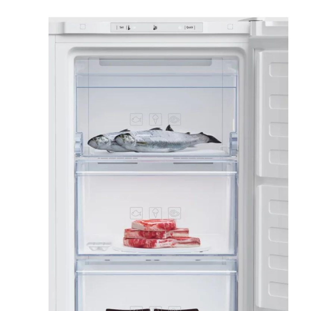 Congélateur BEKO RFNM200E40WN avec porte blanche et rangement intérieur spacieux pour aliments congelés.