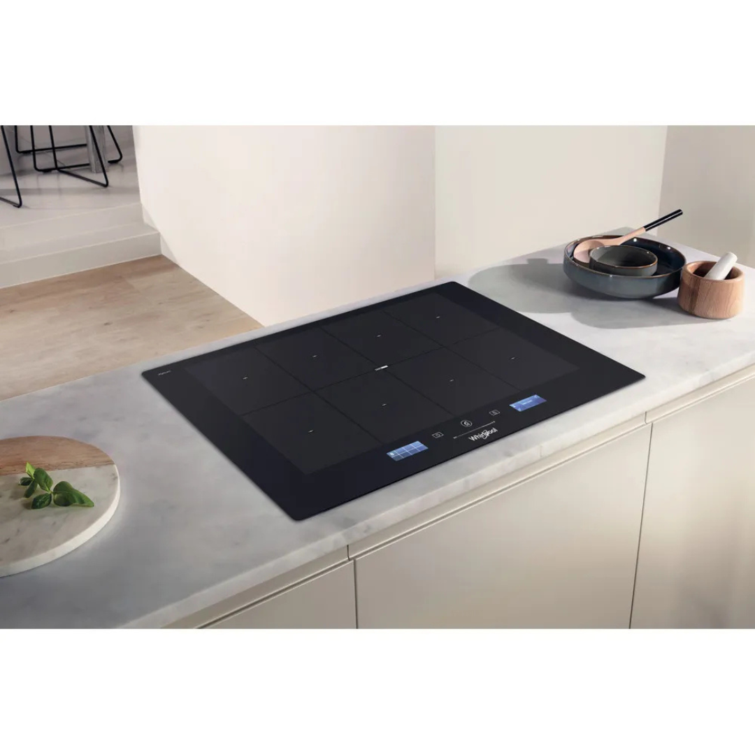 Table de cuisson Whirlpool SMP778CNEIXL avec quatre zones de cuisson en vitroceramic, vue de l'ensemble.